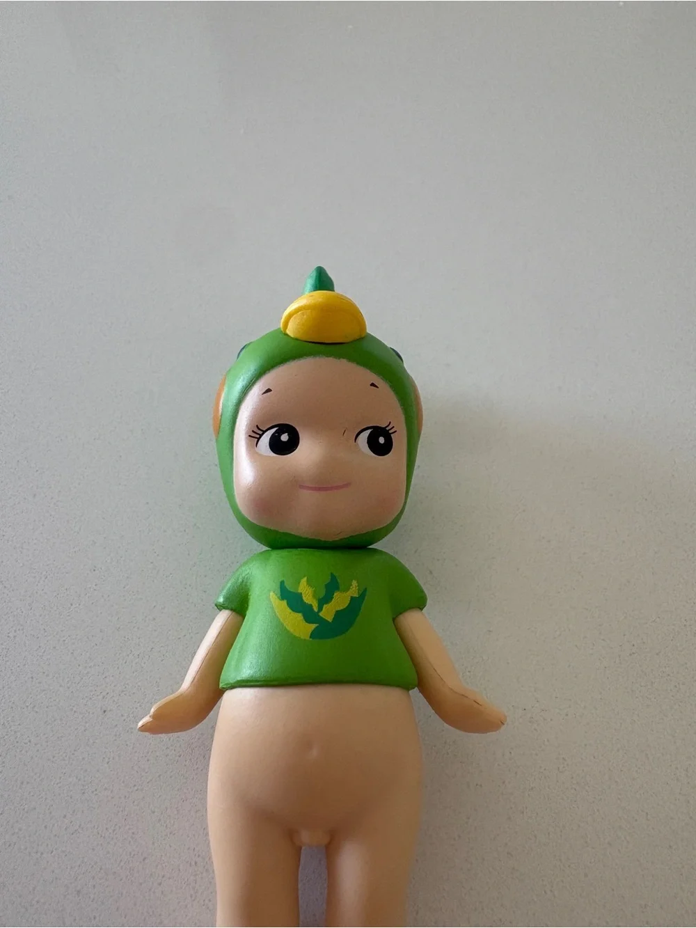 Green Baby Doll Figure in Bird Costume - Kids Toy